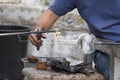 Glassblower working in liquid glass ball Royalty Free Stock Photo