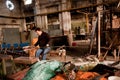 Glassblowing artisan at work in a crystal glass workshop