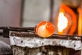 Glassblowing Piece and Furnace in Background Royalty Free Stock Photo