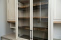 glassdoor pantry cabinet with no contents Royalty Free Stock Photo