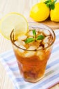 Glasse of ice tea with lemons and mint