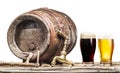 Glasses of  beer and ale barrel on the wooden table. Craft brewery. Clipping paths Royalty Free Stock Photo