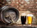 Glasses of  beer and ale barrel on the wooden table. Craft brewery Royalty Free Stock Photo