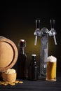 Glasses of beer and ale on a dark table. Craft brewery. beer tap Royalty Free Stock Photo