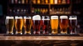 glasses of beer of different varieties in a row on the bar counter Royalty Free Stock Photo