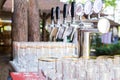 Glasses for beer and a beer faucet on the summer terrace Royalty Free Stock Photo