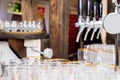 Glasses for beer and a beer faucet on the summer terrace Royalty Free Stock Photo