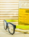 Glasses and beer in glass on bamboo background Royalty Free Stock Photo