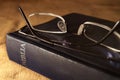 Glasses on Bible Royalty Free Stock Photo