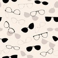 Glasses with black and brown frames of different shapes on a beige background, seamless pattern illustration. Royalty Free Stock Photo