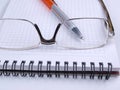 Glasses on blocknote two Royalty Free Stock Photo