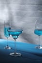Glasses with blue alcohol cocktail ready for a party