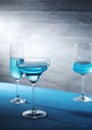 Glasses with blue alcohol cocktail ready for a party