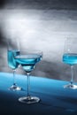 Glasses with blue alcohol cocktail ready for a party