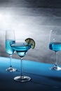 Glasses with blue alcohol cocktail ready for a party