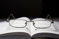 Glasses and a book Royalty Free Stock Photo