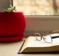 Glasses and books