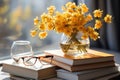 Glasses on books yellow flowers in a vase on a white background create a charming scene, educational photo