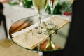 Glasses and bottles of cold champagne for the toast of the couple