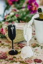 Glasses and bottles of cold champagne for the toast of the couple