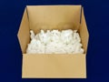 Glasses in a box with bio-degradable packaging peanuts