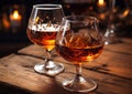 Glasses of brandy cognac alcoholic drink on wooden table.Macro.AI Generative