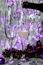 Glasses with champagne against the background of New Year`s decoration. Royalty Free Stock Photo