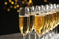 Glasses of champagne against blurred lights. Bokeh effect Royalty Free Stock Photo