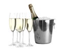 Glasses with champagne and bottle in bucket Royalty Free Stock Photo