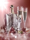 Glasses of champagne with bottle in cooler Royalty Free Stock Photo