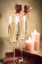 Glasses of champagne in candlelit on St Valentine's day Royalty Free Stock Photo