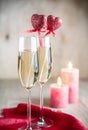 Glasses of champagne in candlelit on St Valentine's day Royalty Free Stock Photo