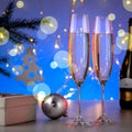 Glasses of champagne and christmas decorations. Merry Christmas And Happy New Year Royalty Free Stock Photo