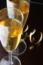 Glasses of champagne and gold streamer Royalty Free Stock Photo