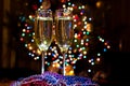 Champagne glasses on New Year's Eve. Merry christmas and a happy new year! Royalty Free Stock Photo