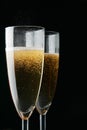 Glasses of champagne over black Royalty Free Stock Photo