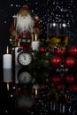 Glasses with champagne, Santa Claus and christmas decoration Royalty Free Stock Photo