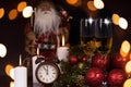 Glasses with champagne, Santa Claus and christmas ornaments Royalty Free Stock Photo