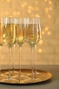 Glasses of champagne served on grey table Royalty Free Stock Photo