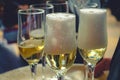 glasses of champagne wine on the table in a wedding celebration closeup