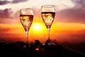 Glasses with champers at sunset Royalty Free Stock Photo