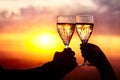 Glasses with champers at sunset Royalty Free Stock Photo