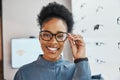 Glasses check, black woman portrait and shopping in a store looking through lens. Eye consulting, smile and eyewear Royalty Free Stock Photo