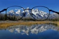 Glasses and Clear Vision of Mountains Royalty Free Stock Photo