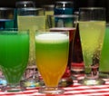 Glasses with a cocktail. Multicolored drinks.