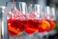 Glasses of cocktails on the bar. bartender pours a glass of sparkling wine with Aperol. Royalty Free Stock Photo