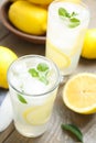 Glasses of cold lemonade on wooden table, above view Royalty Free Stock Photo
