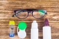 Glasses, containers for cleaning contact lenses, to improve vision Royalty Free Stock Photo