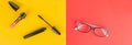 Glasses and cosmetics on a yellow and red background. Wide photo Royalty Free Stock Photo