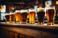 Glasses with craft beer on wooden bar. Royalty Free Stock Photo